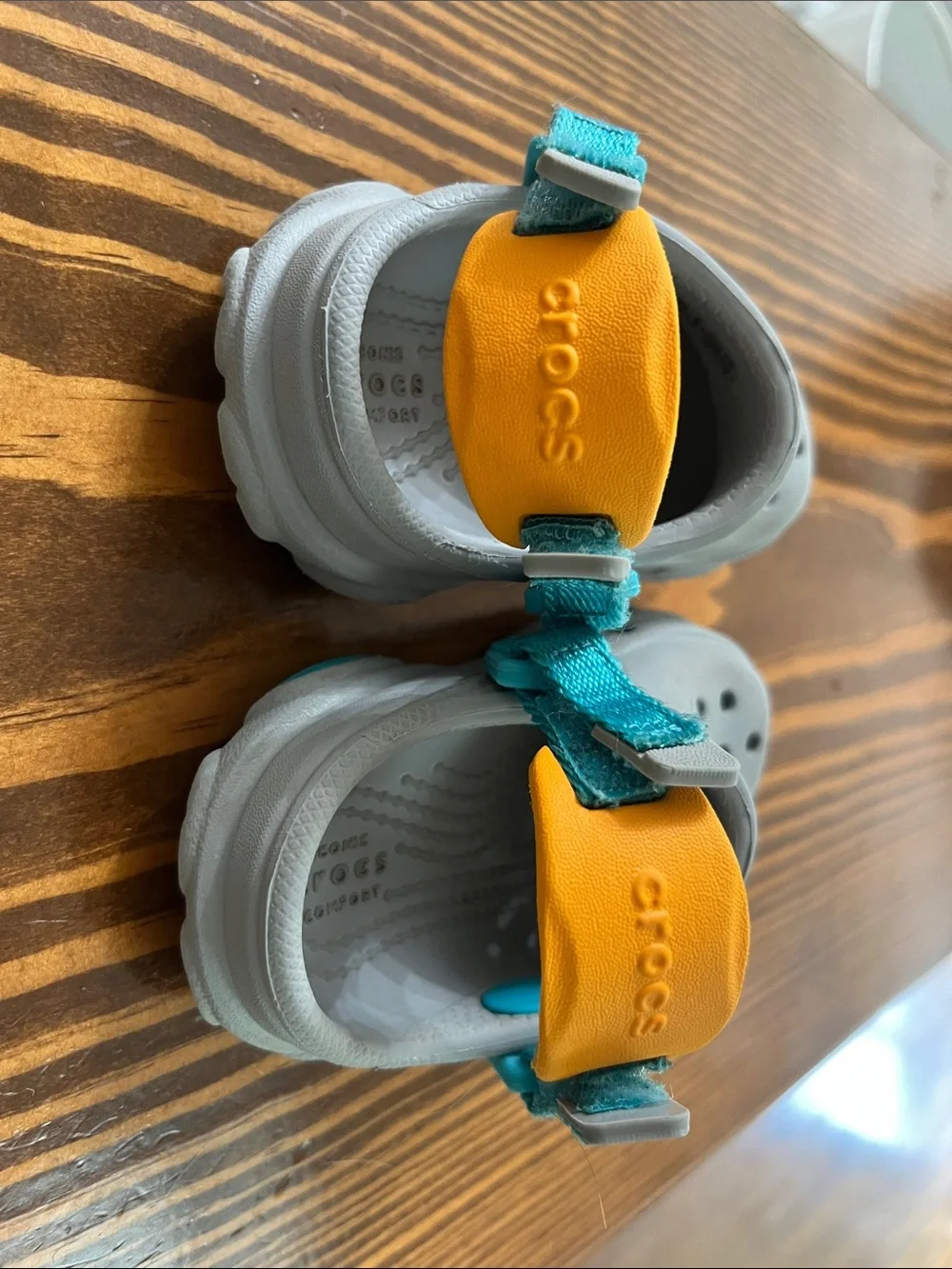 CROCS Kids Clogs with Teal and Yellow Accents